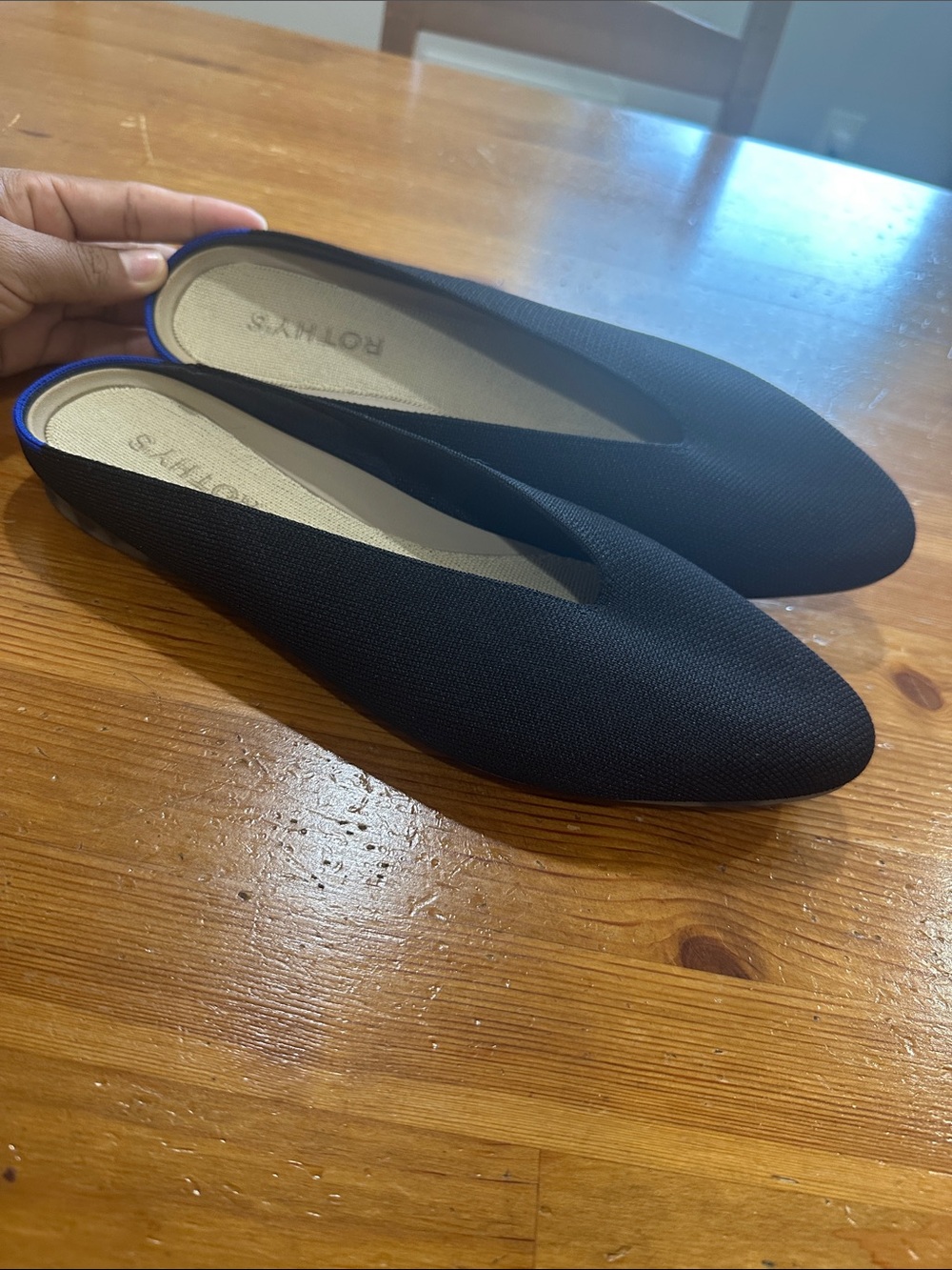 Rothy's Black Pointed Slip-On Flats with Blue Trim